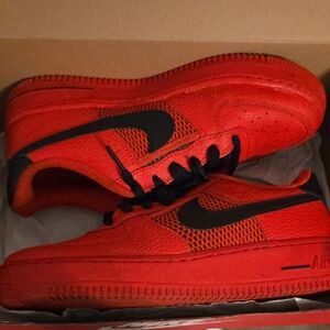 Vibrant Red Sneakers with Black Accents